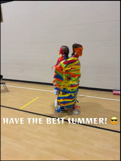 Principal Brown and Principal Green duct taped together with multi colored duct tape.