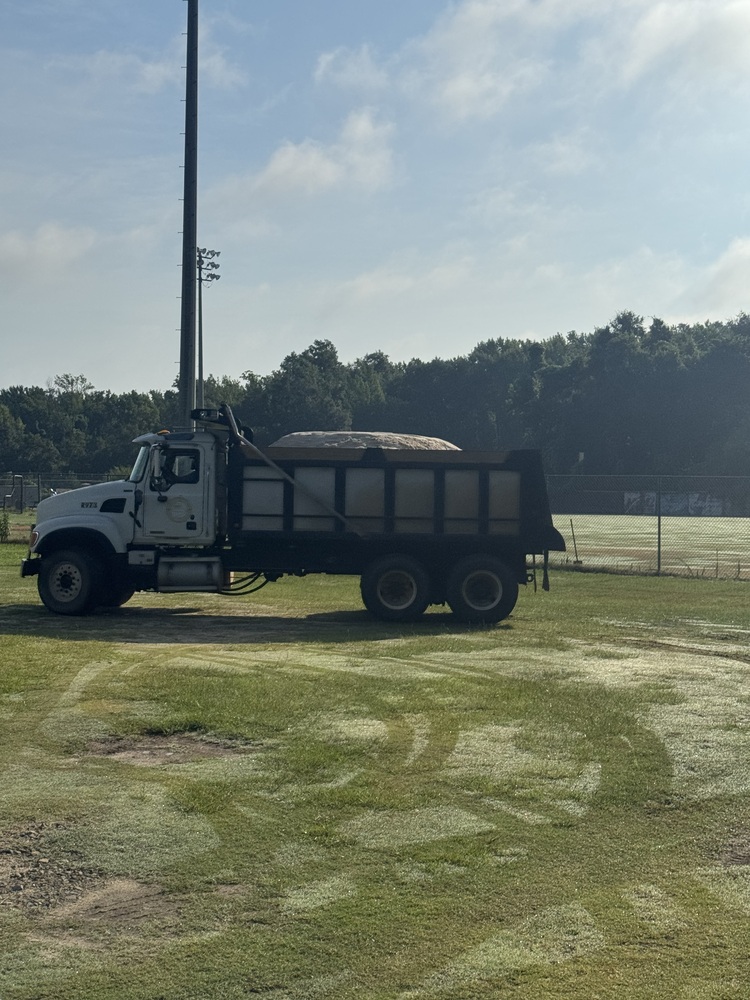 truck holding sand to be used on the ccmhs baseball field