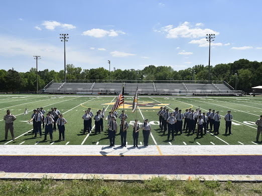 jrotc students stand ready for promotion ceremony