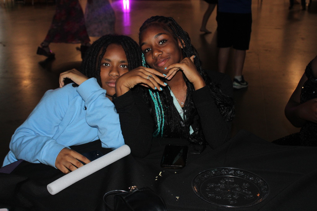 two students posing for the camera at the spring dance