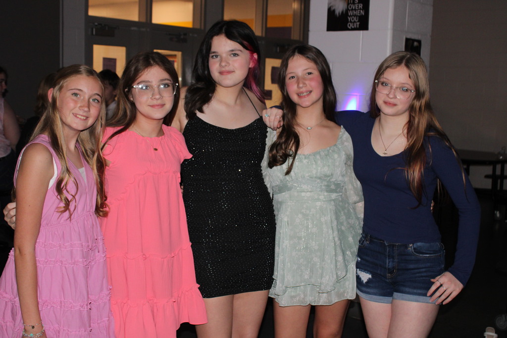 students posing for camera at the spring dance