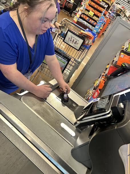 student practices scanning at Kroger