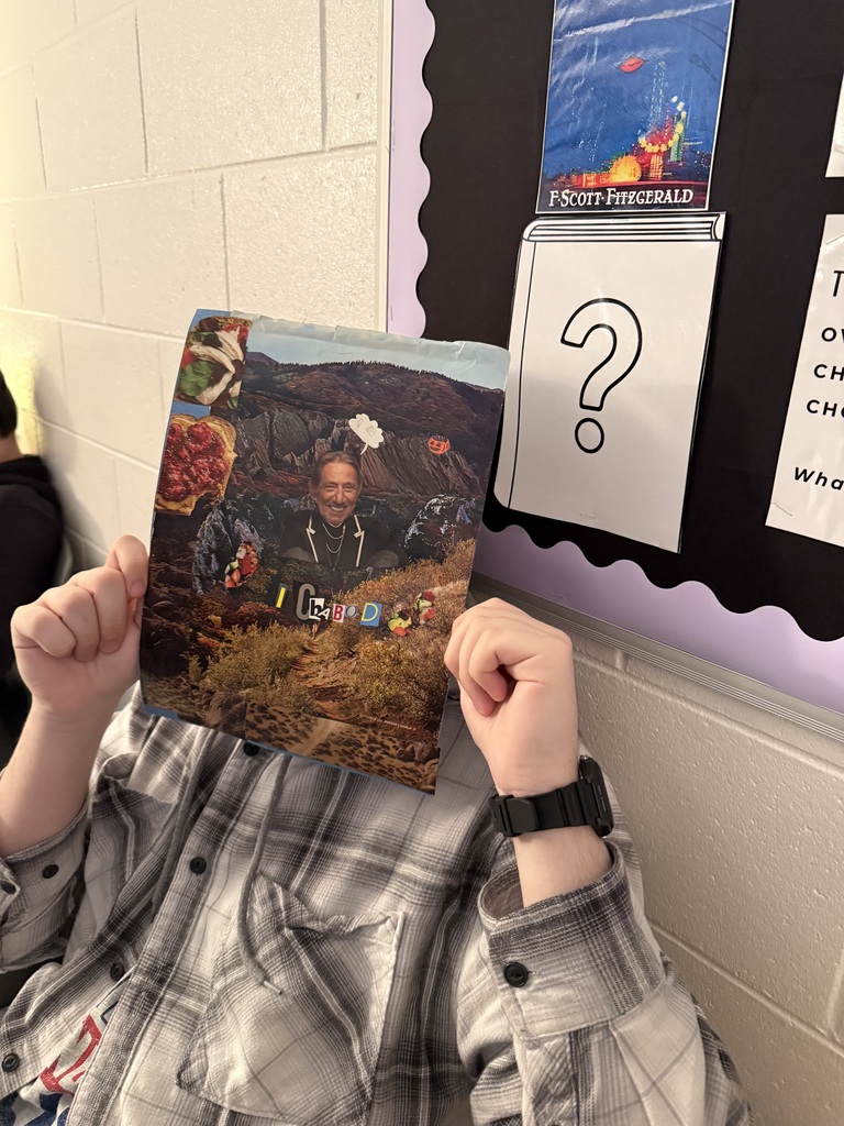 student showing their collage