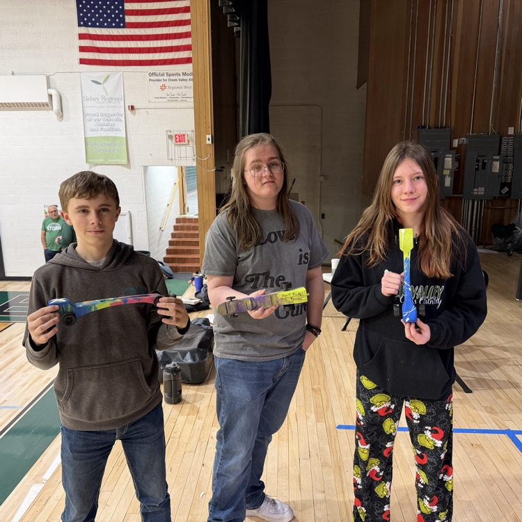 3 students with their co2 dragsters 