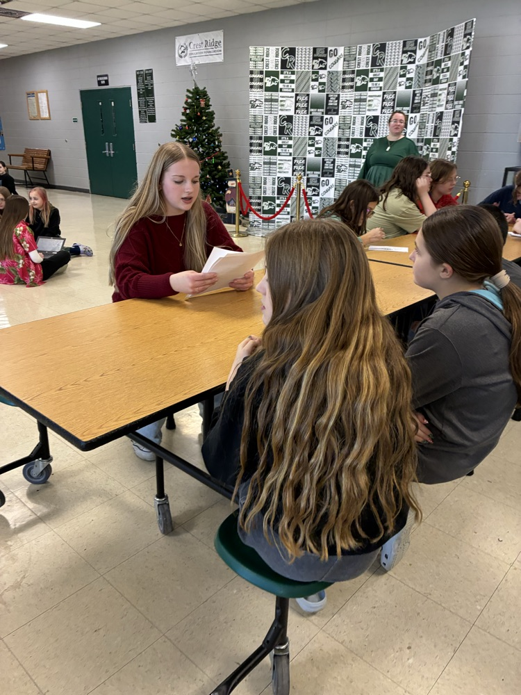 Students being read to.