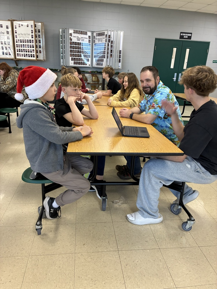 Students being read to.
