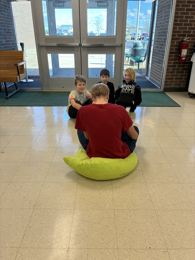 Students being read to.