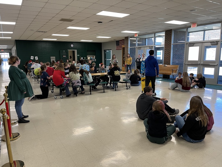 Students being read to.