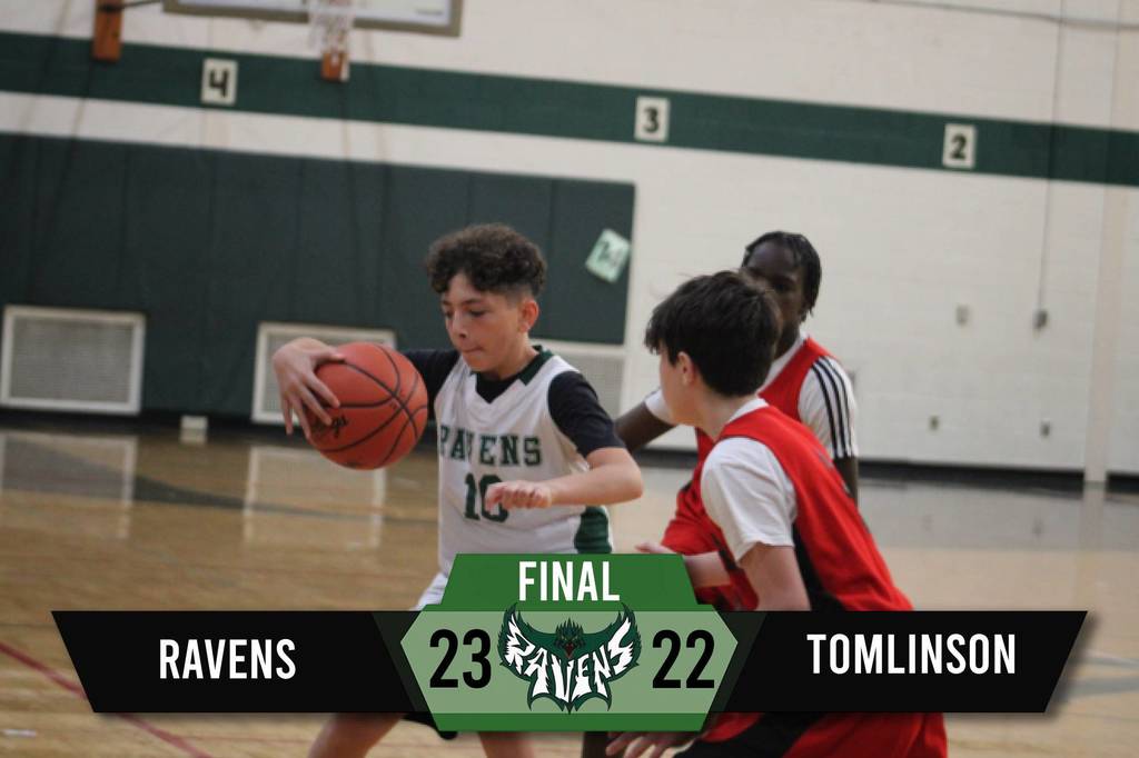 7th Grade pulls off a 23–22 victory over Tomlinson.