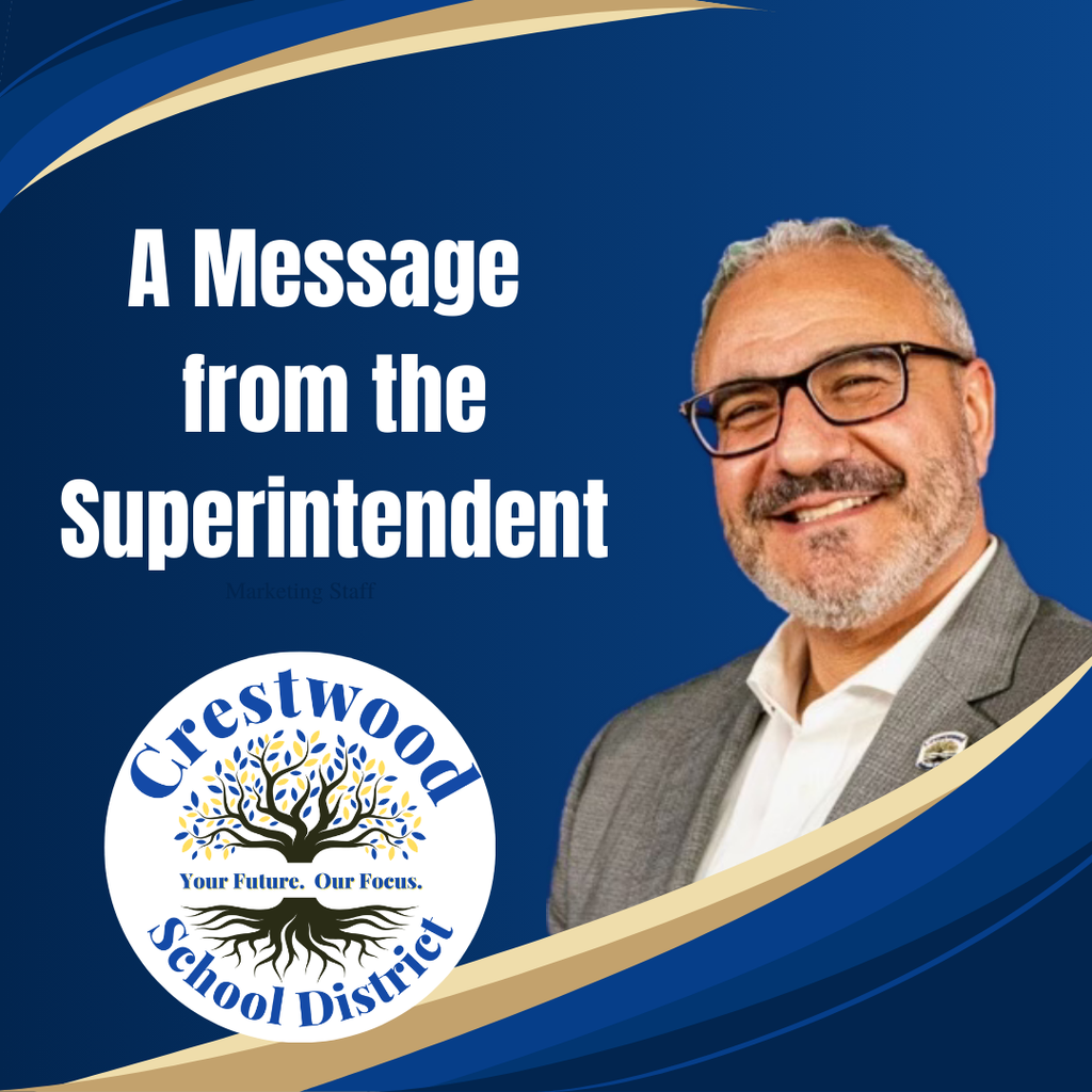 A graphic for the Crestwood School District featuring a blue background with gold and dark blue curved accents in the top left and bottom right corners. In the upper left, the text reads "A Message from the Superintendent" in bold white letters. To the right is a professional portrait of a smiling man with glasses, a gray beard, and a gray suit jacket over a white shirt. In the bottom left corner, there is a circular white logo for the Crestwood School District, which depicts a stylized tree with blue and yellow leaves and the motto "Your Future. Our Focus."