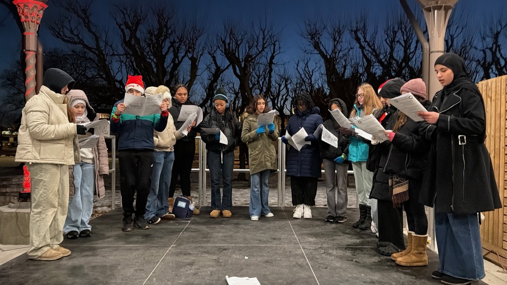 Riverside Choir performs at Holiday Nights in Greenfield Village. 