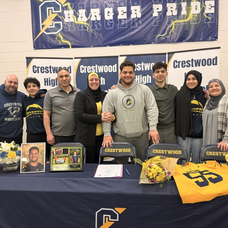 Hussein Ajrouche honors his family on his signing day
