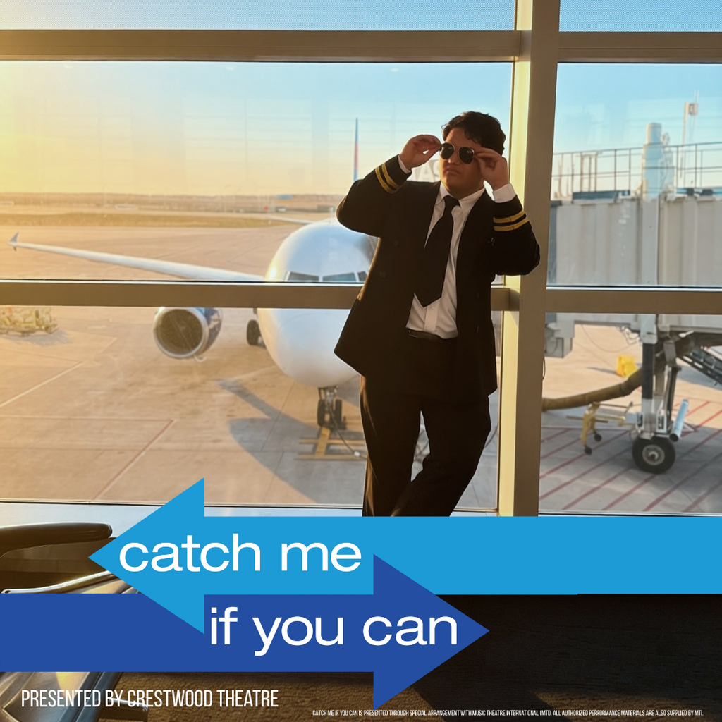 A promotional image set inside an airport terminal with large windows showing a parked airplane and jet bridge outside on the runway in warm, golden light. In the foreground, a person dressed as a pilot stands leaning against a window frame, wearing a black suit with gold-striped cuffs, a white shirt, black tie, and dark sunglasses, which they are adjusting with both hands. The scene has a cinematic feel with sunlight casting long shadows across the floor.  Across the lower middle of the image are two overlapping arrow graphics, one light blue pointing left and one darker blue pointing right. Inside the arrows, white text reads “catch me” on the left arrow and “if you can” on the right arrow. At the bottom left, white text reads “PRESENTED BY CRESTWOOD THEATRE.” Along the bottom in very small white text, it reads, “CATCH ME IF YOU CAN IS PRESENTED THROUGH SPECIAL ARRANGEMENT WITH MUSIC THEATRE INTERNATIONAL (MTI). ALL AUTHORIZED PERFORMANCE MATERIALS ARE ALSO SUPPLIED BY MTI.”