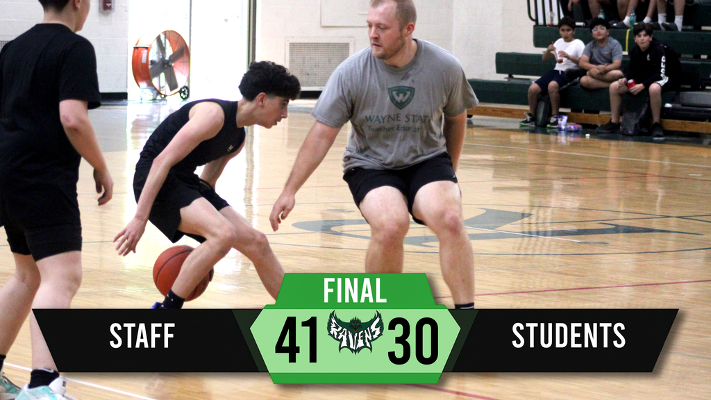 A basketball game on an indoor court. A player dribbles while another defends. The score reads "Final 41 Staff 30 Students."