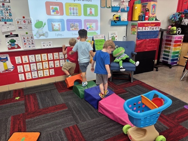 Preschools enjoying center time.