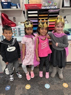 Students wearing crowns.