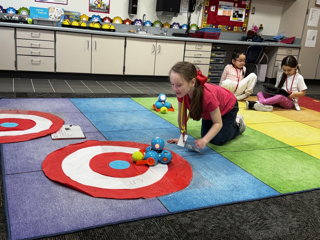 Students working together in computer science class.