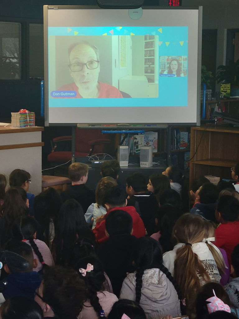 A picture of a guy on the overhead projector. 