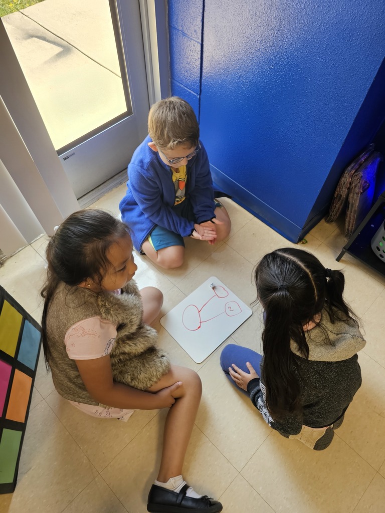 Burgess's First Grade Class at Crockett Elementary is actively engaged in practicing number bonds.