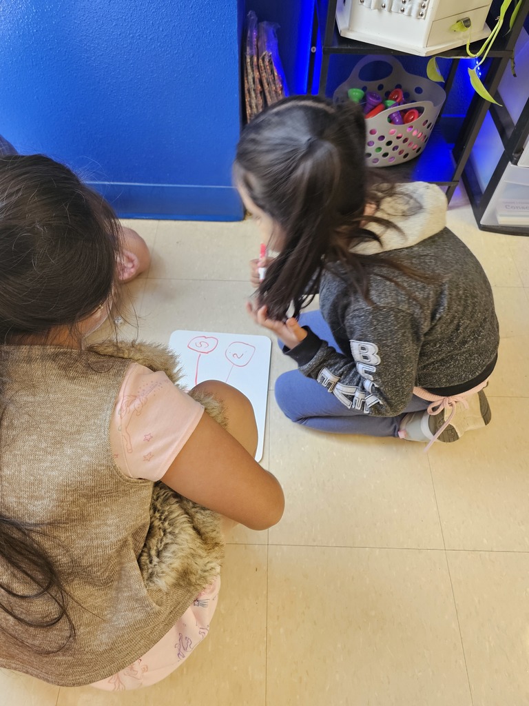 Burgess's First Grade Class at Crockett Elementary is actively engaged in practicing number bonds.