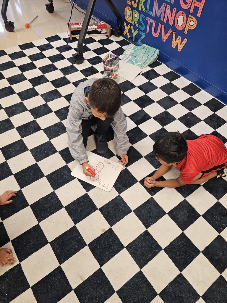 Burgess's First Grade Class at Crockett Elementary is actively engaged in practicing number bonds.