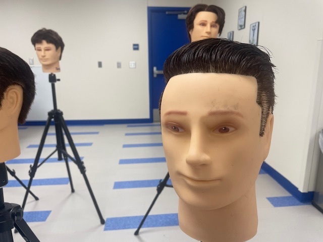 Crockett High School Cosmetology II class showed off their Clipper Haircut techniques.