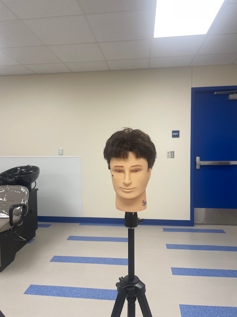 Crockett High School Cosmetology II class showed off their Clipper Haircut techniques.