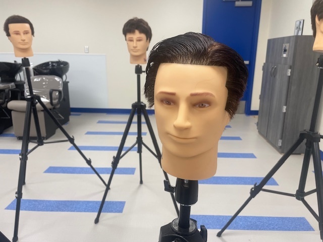 Crockett High School Cosmetology II class showed off their Clipper Haircut techniques.