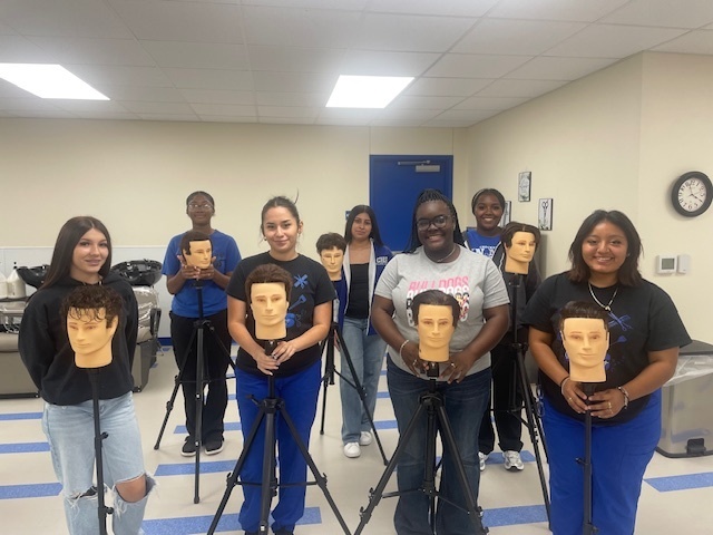 Crockett High School Cosmetology II class showed off their Clipper Haircut techniques.