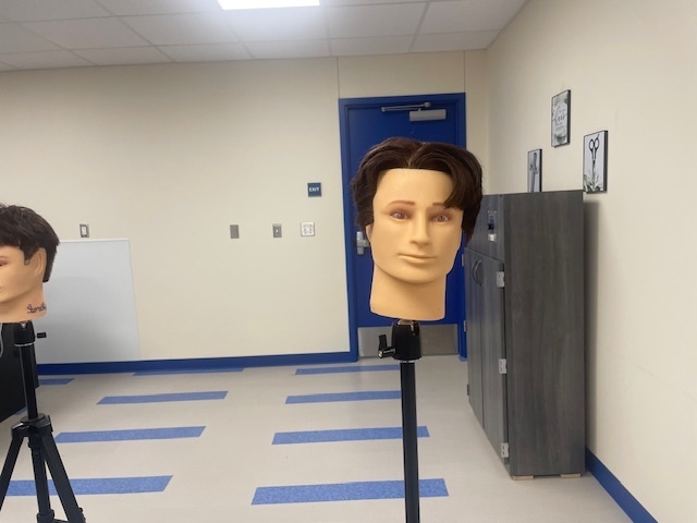 Crockett High School Cosmetology II class showed off their Clipper Haircut techniques.