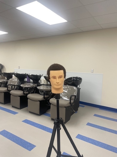 Crockett High School Cosmetology II class showed off their Clipper Haircut techniques.