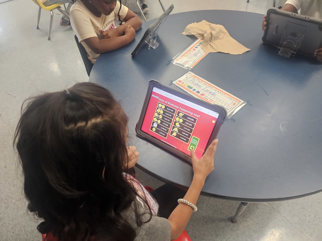 Early Childhood students using new technology equipment
