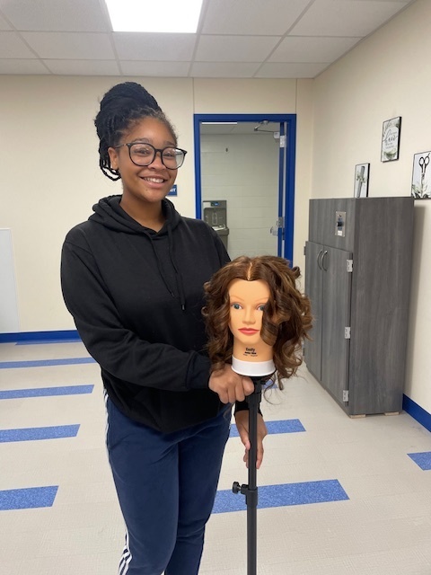 ✨ Hands-on Excellence in Cosmetology ✨ Mrs. Commander's Cosmetology II students at Crockett High School are mastering advanced techniques with style and precision.  Micah Buckingham, Da'Nejah Leonard, and Jennifer Davila are skillfully learning to use the Marcel curling iron, perfecting their control and artistry.  Savannah Ramos, A'Kedria Delane, and Edrinette Simpson are confidently performing permanent wave procedures, showcasing their growing expertise in texture services.