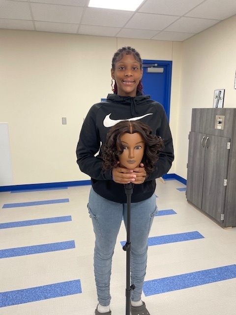 ✨ Hands-on Excellence in Cosmetology ✨ Mrs. Commander's Cosmetology II students at Crockett High School are mastering advanced techniques with style and precision.  Micah Buckingham, Da'Nejah Leonard, and Jennifer Davila are skillfully learning to use the Marcel curling iron, perfecting their control and artistry.  Savannah Ramos, A'Kedria Delane, and Edrinette Simpson are confidently performing permanent wave procedures, showcasing their growing expertise in texture services.