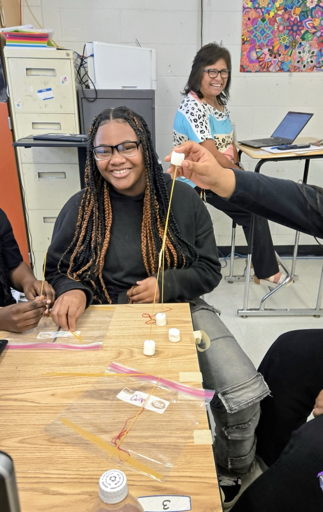 future business students build marshmallow towers
