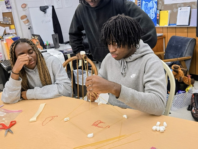 future business students build marshmallow towers