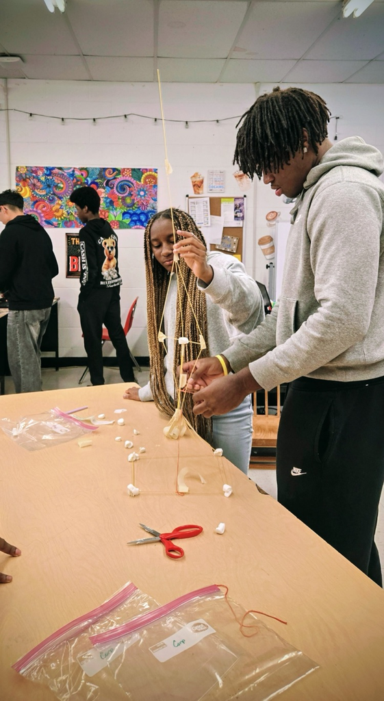 future business students build marshmallow towers