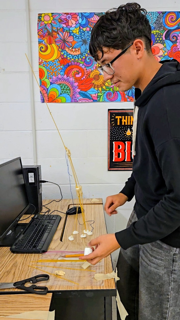 future business students build marshmallow towers