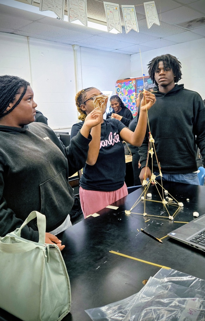 future business students build marshmallow towers