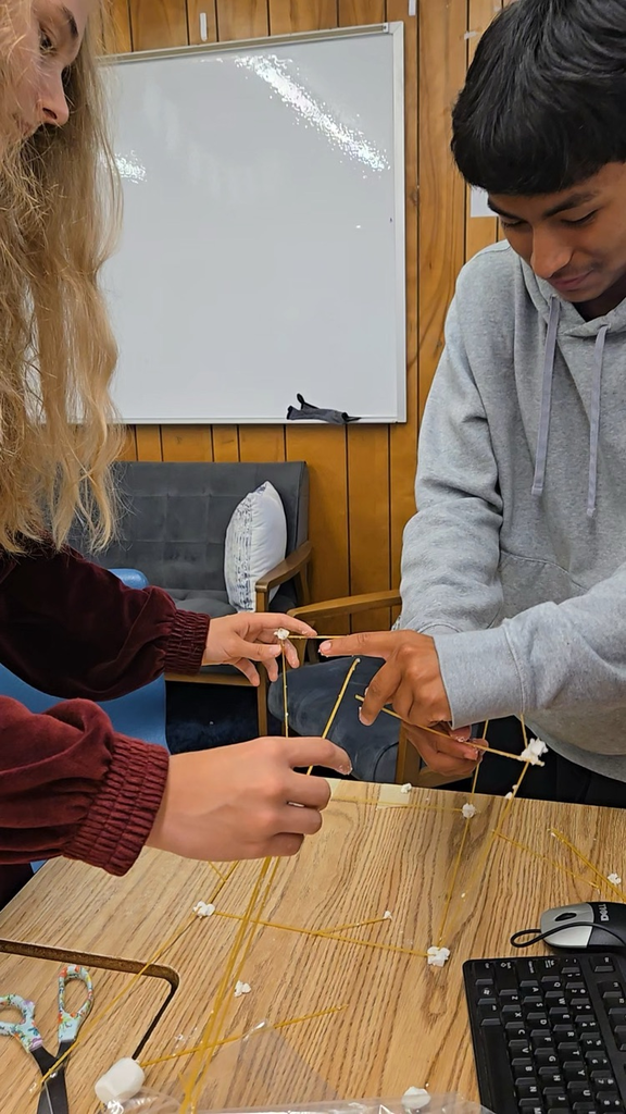 future business students build marshmallow towers