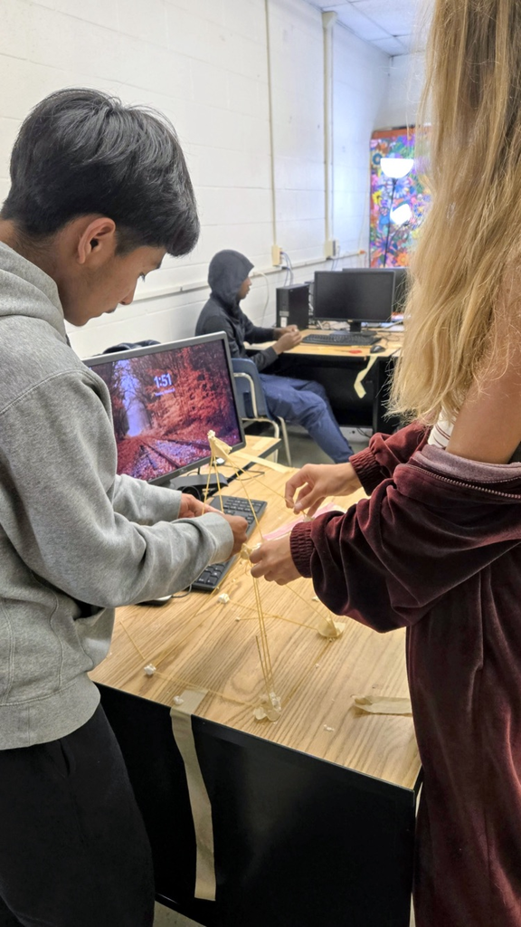 future business students build marshmallow towers
