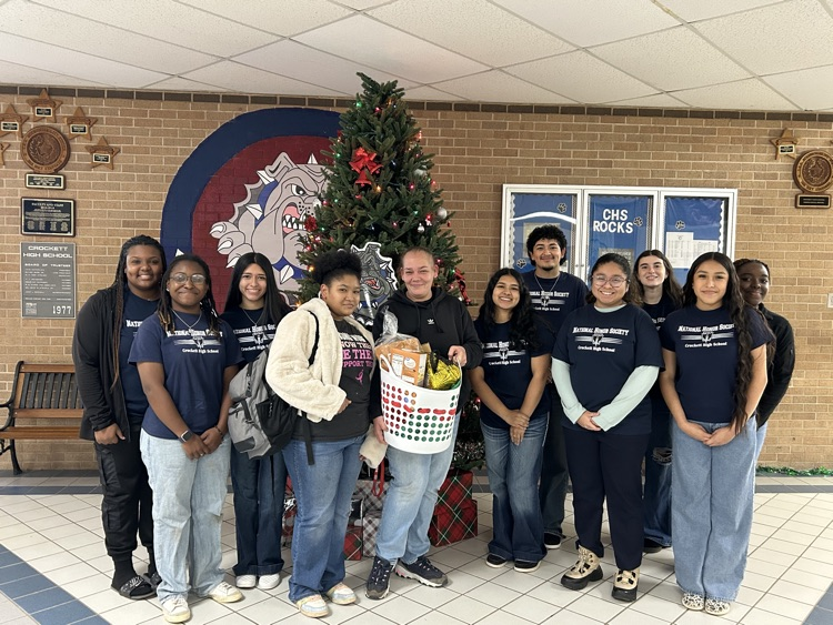 In the spirit of giving back, the National Honor Society blessed five families with holiday baskets this week.  