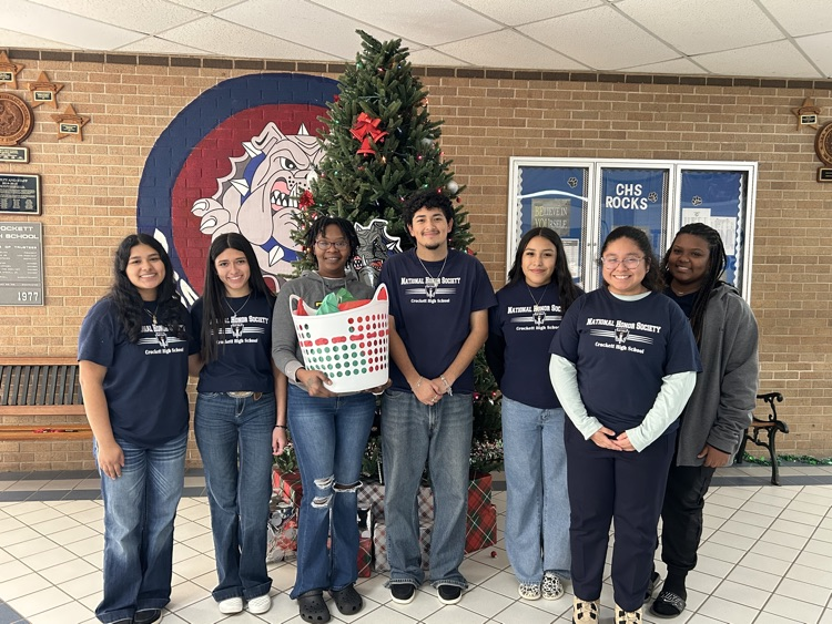 In the spirit of giving back, the National Honor Society blessed five families with holiday baskets this week.  