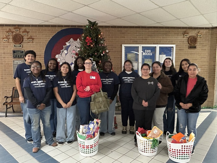 In the spirit of giving back, the National Honor Society blessed five families with holiday baskets this week.  