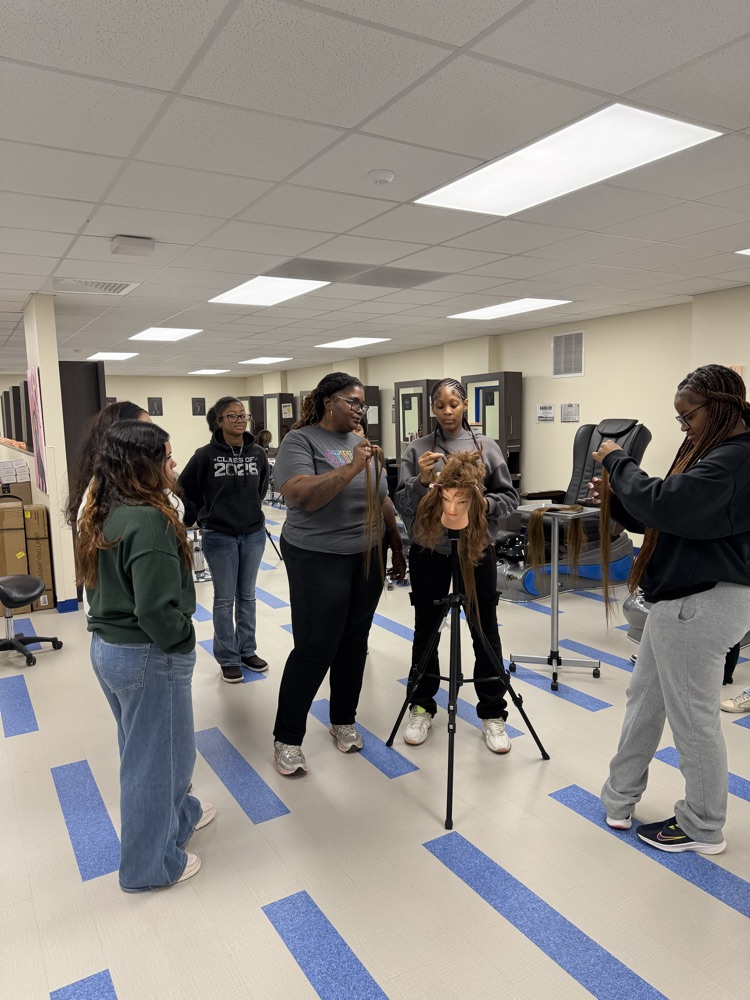 And Ms. Shambrica Creag came today and did a Natural hair braiding class for Cosmo 1 and 2.