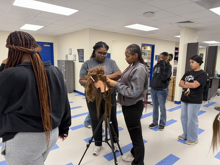 And Ms. Shambrica Creag came today and did a Natural hair braiding class for Cosmo 1 and 2.