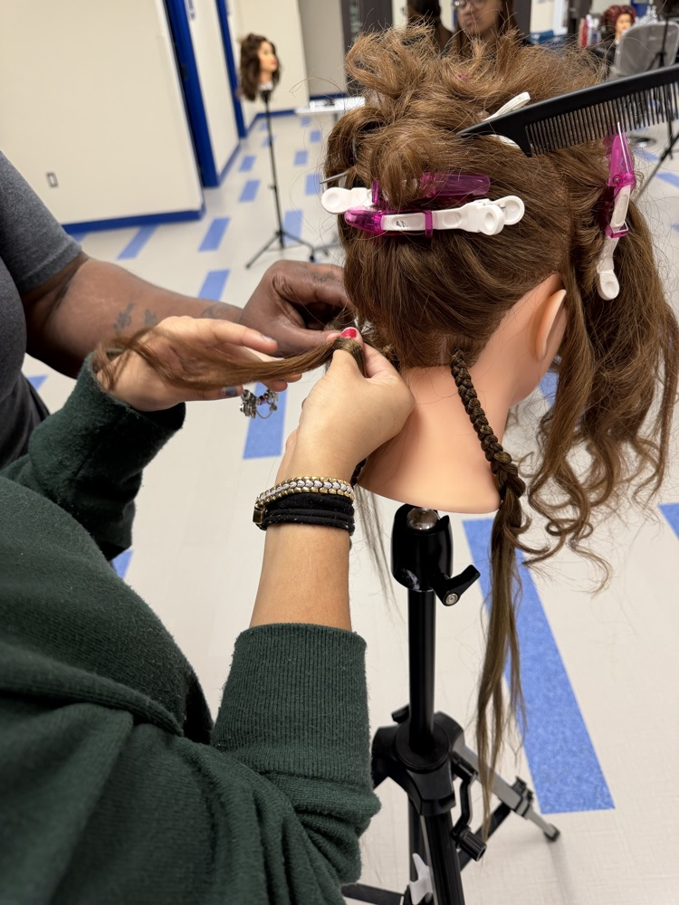 And Ms. Shambrica Creag came today and did a Natural hair braiding class for Cosmo 1 and 2.
