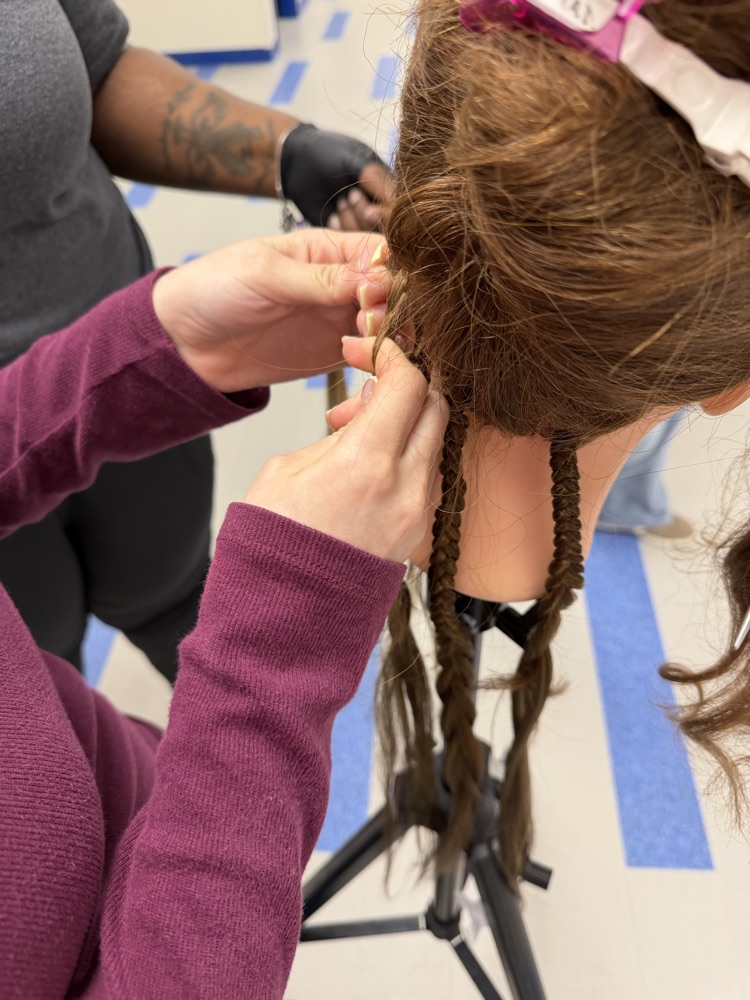 And Ms. Shambrica Creag came today and did a Natural hair braiding class for Cosmo 1 and 2.