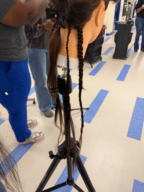 On Monday, Shambrica Creag returned, and the Cosmetology students showcased the braiding techniques she taught them last week.