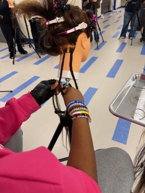 On Monday, Shambrica Creag returned, and the Cosmetology students showcased the braiding techniques she taught them last week.